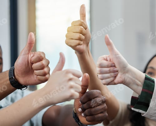 Preview: Closeup shot of a group of unrecognisable businesspeople showing thumbs up