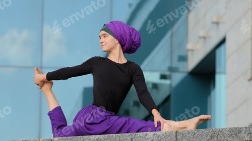Preview: Muslim islamic arabian indian woman in hijab doing yoga workout training strength practicing effort