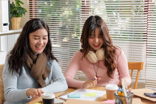 Preview: Young busy businesswomen meet, office team working, consulting financial project data, smiling