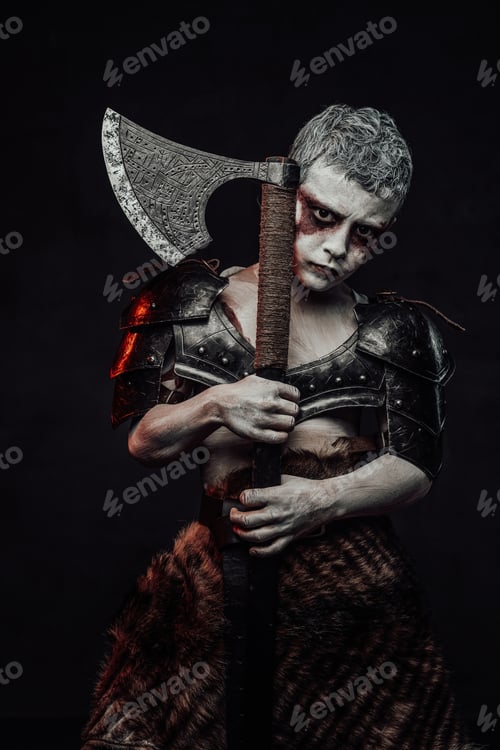 Preview: Serious boy barbarian with axe posing in dark background