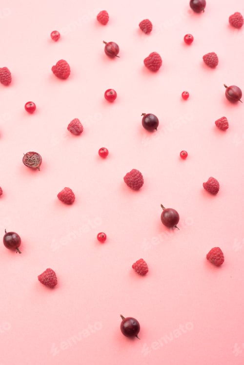 Preview: Berries isolated over pink background table.