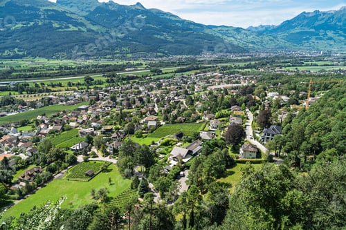Preview: Scenic Panorama of Vaduz, Liechtenstein A Picturesque Alpine Village Landscape in Europe