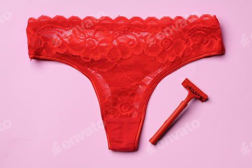 Preview: Women's panties and razor flat lay top view