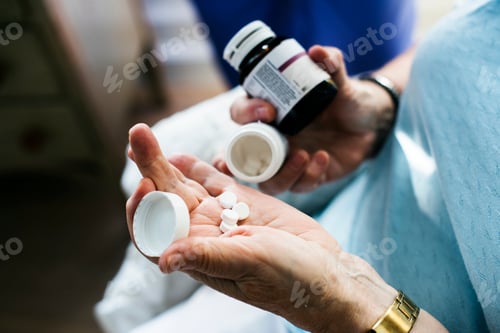 Preview: Senior woman taking medicine