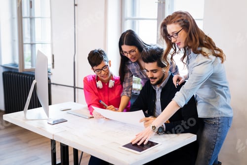Preview: Picture of young architects discussing in office