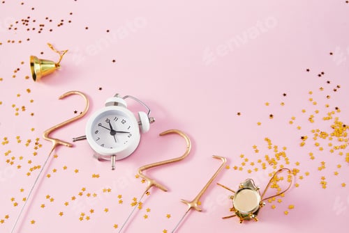 Preview: New Year 2021 Golden numbers 2021 with an alarm clock on a pink background