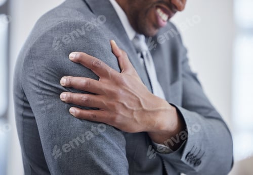 Preview: Shot of an unrecognisable businessman experiencing tension in a modern office