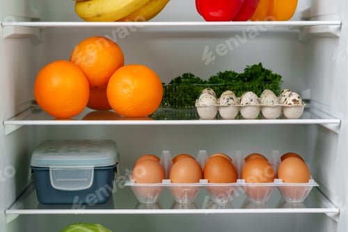 Preview: Well-Stocked Refrigerator With Fresh Produce, Eggs, and Other Groceries