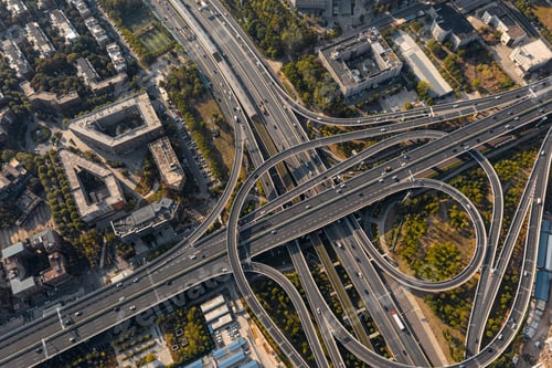 Preview: Aerial drone view of a traffic on a road junction in Wuhan on a sunny day