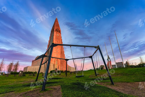Preview: Holy largest Hallgrimskirkja Lutheran Church with sunset sky in central of Reykjavik downtown