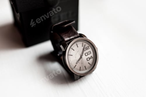 Preview: men's watch on a light background. Accessories for a businessman