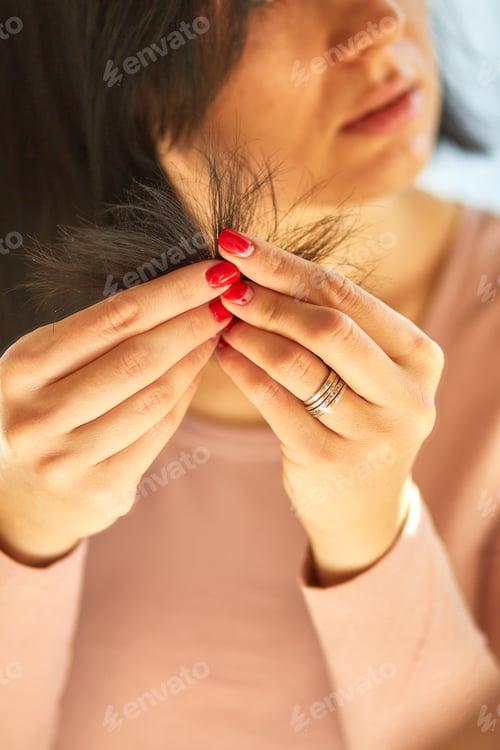 Preview: Problem damaged hair concept, Pretty Brunette woman brushing hair with comb