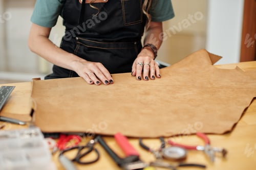 Preview: Woman Working with Leather