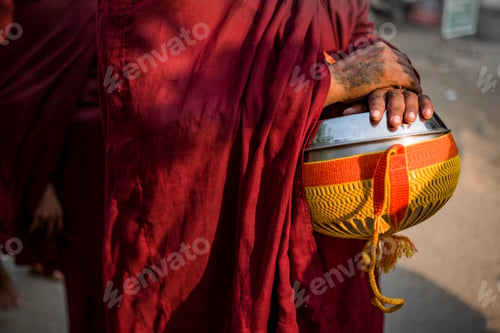 Preview: Monk collecting alms in Yangon (Rangoon), Myanmar (Burma)