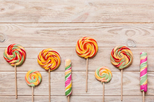 Preview: Set of colorful lollipops on colored background. Summer concept. Party Happy Birthday
