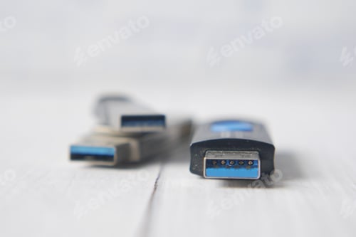 Preview: USB flash drive on pink background close up