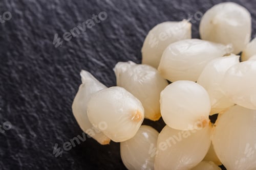 Preview: pickled vegetables on a dark stone background