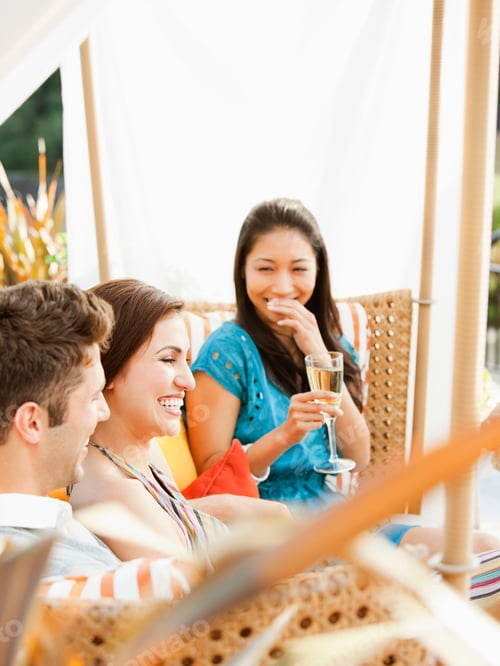 Preview: Friends drinking champagne together