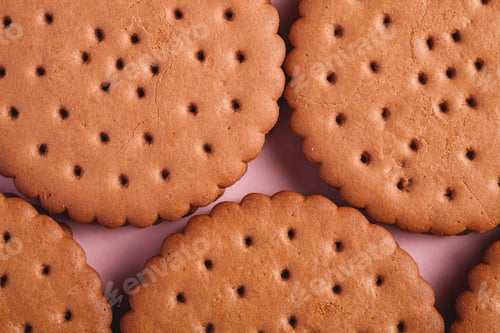 Preview: Chocolate sandwich cookie with cream on pink background