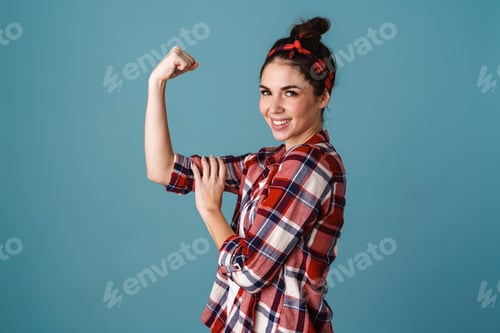 Preview: Smiling Woman Flexing Arm in Red Plaid Shirt