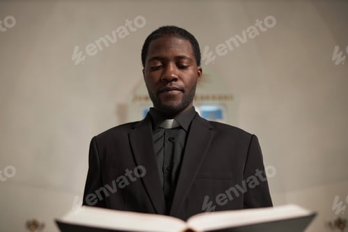 Preview: African American Man as Priest Speaking in Church