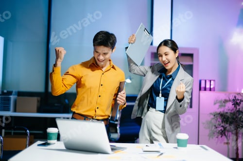 Preview: Asian business colleagues celebrating success in modern office, teamwork achievement,