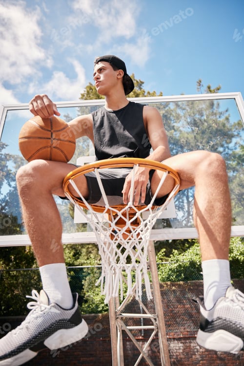 Preview: Basketball, sports and man on basket with ball for fitness, exercise and training workout at a comm