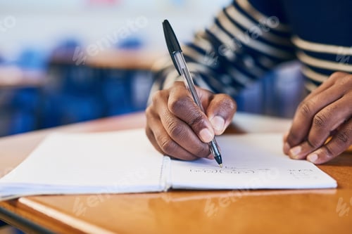 Preview: Maths is my favorite subject. Cropped shot of a university student writing in her notebook.