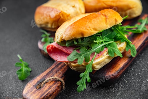 Preview: sandwich salami bun, sausage, arugula, green lettuce ready to eat cooking appetizer meal food snack