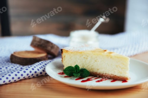 Preview: triangle cheese cakes in cafe. On a wooden table