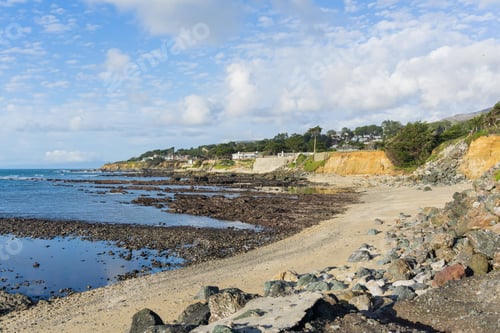 Preview: Sandy beach and eroded cliffs