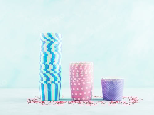 Preview: Colorful Cupcake Liners with Sprinkles on Light Background