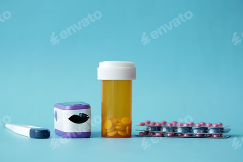 Preview: pulse oximeter, medical pills and blister pack on blue background