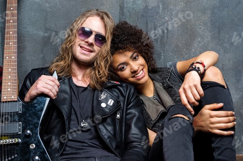 Preview: portrait of young stylish man and woman in love