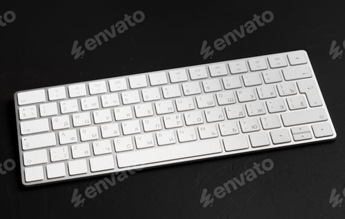 Preview: Office table with keyboard Isolated on black background