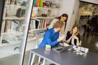 Preview: Young business team working in a modern office