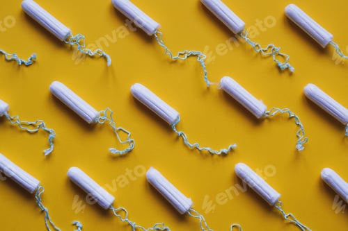 Preview: tampon flat lay - many tampons arrangement in rows - period or menstruation concept