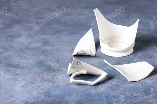 Preview: Fragments of white fragile porcelain cup