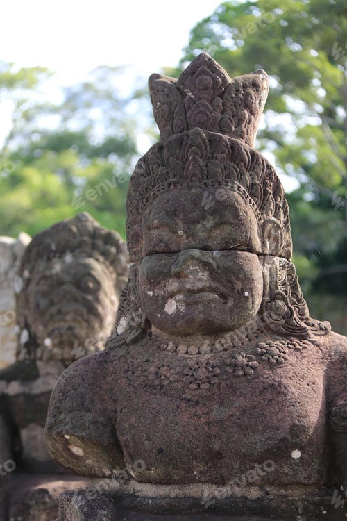 Preview: Antique statue standing majestically in the Angkor Wat temple complex in Cambodia