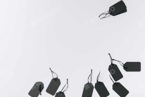 Preview: top view of arrangement of black blank tags isolated on white