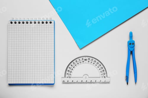 Preview: Protractor ruler, paper sheet, notebook and compass on white background, flat lay