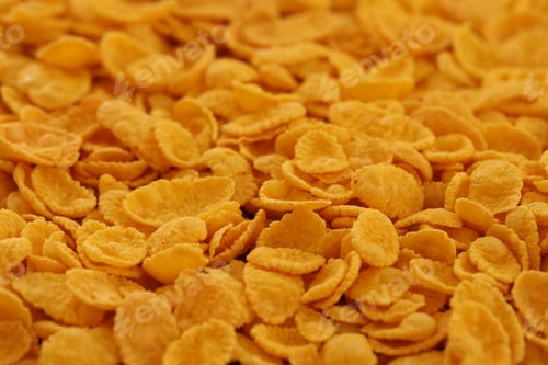 Preview: Corn flakes background and texture. Top view cornflake cereal box for breakfast