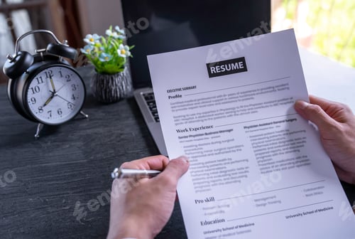 Preview: business man reading and prepare resume to submit job application online, head of HR checking resume