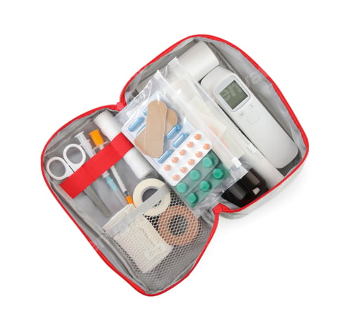 Preview: First aid kit. Different medical supplies in bag isolated on white, top view