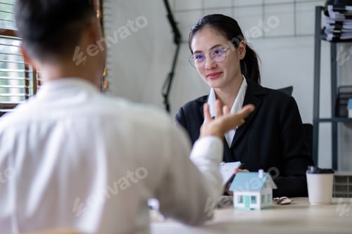 Preview: Client and Real Estate Agent Negotiating Home Purchase Details