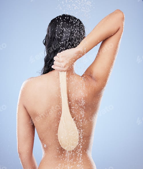 Preview: Shot of an unrecognizable woman taking a shower against a blue background