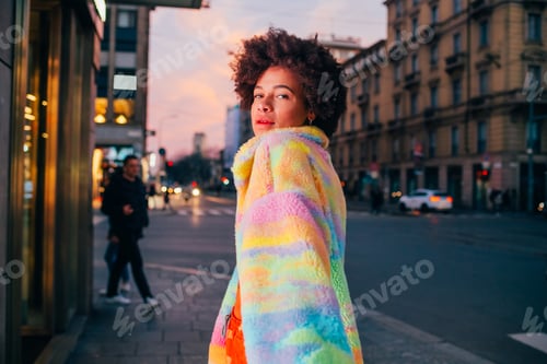 Preview: Fashionable young woman outdoor city living posing stylish and confident