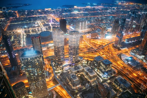 Preview: Top view skyline cityscape city in night illuminations. Street night traffic in Dubai. Waterfront