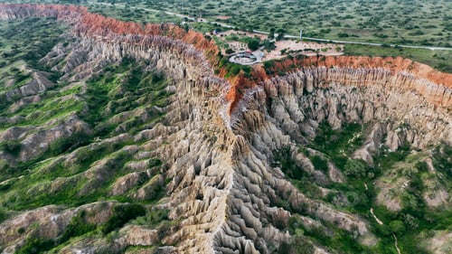 Preview: Stunning lunar landscape in Angola showcasing unique rock formations and lush greenery