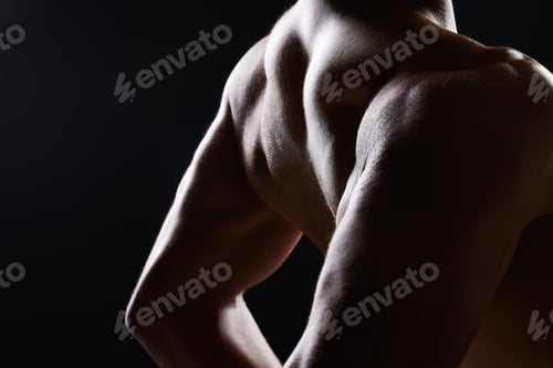 Preview: Man, back and shirtless in dark studio with shadow for wellness, health and strong by black backgro